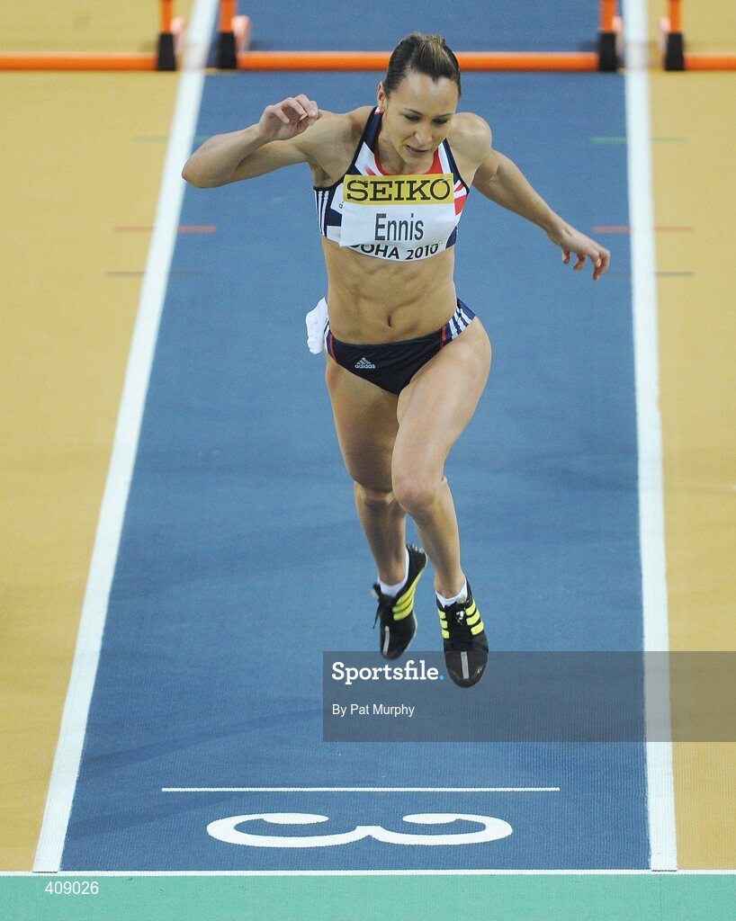 13 March 2010; Jessica Ennis, Great Britain, crosses the finish line to win the 60m hurdles race during the Women's Pentathlon at the 13th IAAF World Indoor Athletics Championships, Doha, Qatar. Picture credit: Pat Murphy / SPORTSFILE