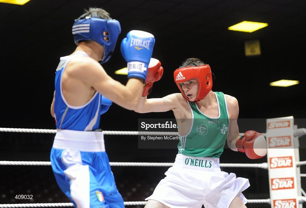 12 March 2010; Gary Molloy, Ireland, exchanges punches with Vincenzo Picardo, Italy, during their 51kg bout. Elite International, National Stadium, Dublin. Picture credit: Stephen McCarthy / SPORTSFILE