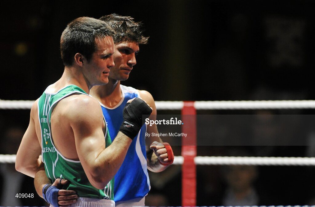 12 March 2010; Darren O'Neill, Ireland, and Luca Podda, Italy, following their 75kg bout. Elite International, National Stadium, Dublin. Picture credit: Stephen McCarthy / SPORTSFILE