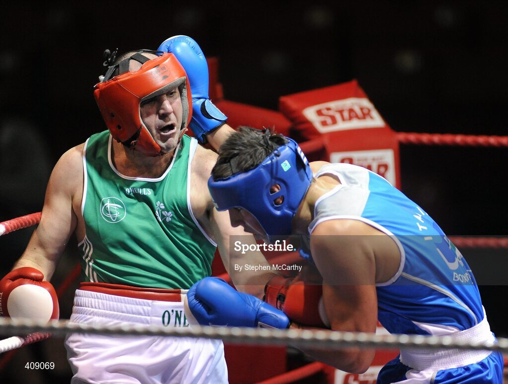 12 March 2010; Disha Gezim, Ireland, exchanges punches with Simone Fiori, Italy, during their 81kg bout. Elite International, National Stadium, Dublin. Picture credit: Stephen McCarthy / SPORTSFILE