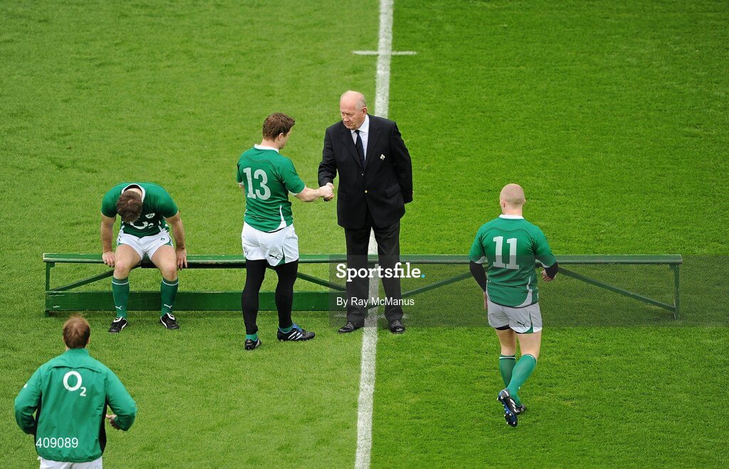 13 March 2010; President of the Irish Rugby Football Union John Callaghan greets Ireland captain Brian O'Driscoll before taking his place on the team bench for the traditional photograph ahead of the RBS Six Nations Rugby Championship, Ireland v Wales, Croke Park, Dublin. Picture credit: Ray McManus / SPORTSFILE