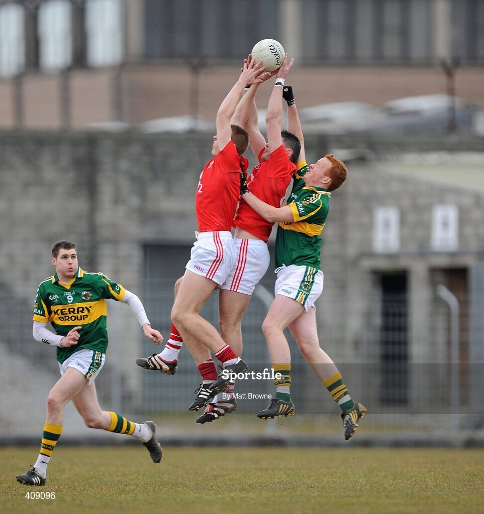 13 March 2010; Chris O'Donovan and Eoin Keane, Cork, in action against Johnny Buckley and Colm Moriarty, 8, Kerry. Cadbury Munster GAA Football Under 21 Quarter-Final, Kerry v Cork, Austin Stack Park, Tralee, Co. Kerry. Picture credit: Matt Browne / SPORTSFILE
