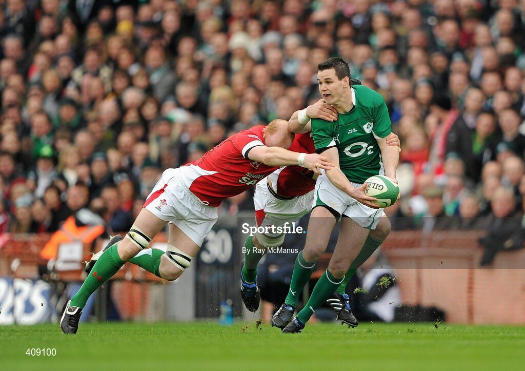 13 March 2010; Ireland's Jonathan Sexton is tackled by Luke Charteris and Martyn Williams, Wales. RBS Six Nations Rugby Championship, Ireland v Wales, Croke Park, Dublin. Picture credit: Ray McManus / SPORTSFILE