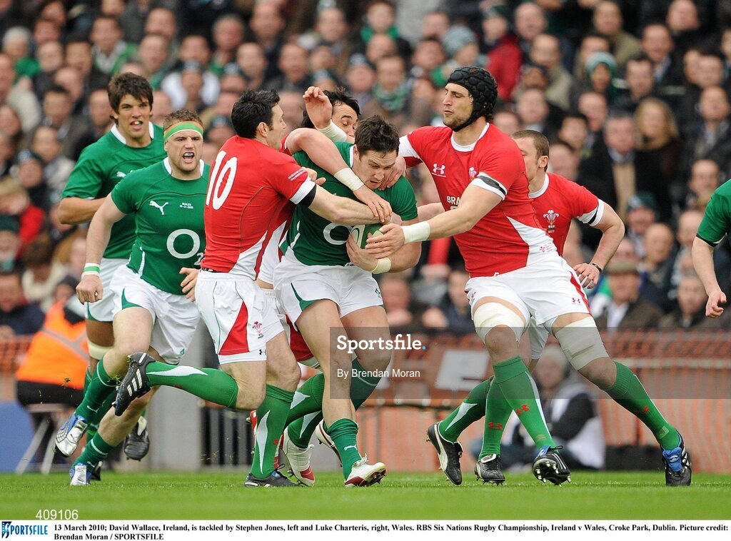 13 March 2010; David Wallace, Ireland, is tackled by Stephen Jones, left and Luke Charteris, right, Wales. RBS Six Nations Rugby Championship, Ireland v Wales, Croke Park, Dublin. Picture credit: Brendan Moran / SPORTSFILE