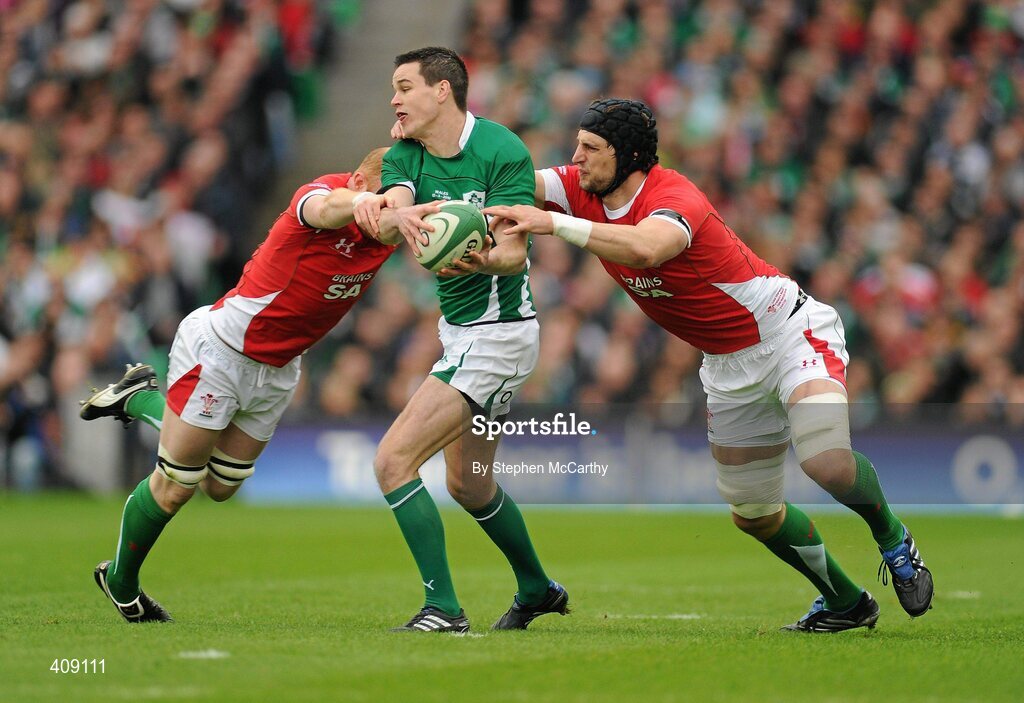 13 March 2010; Jonathan Sexton, Ireland, is tackled by Martyn Williams, left, and Luke Charteris, Wales. RBS Six Nations Rugby Championship, Ireland v Wales, Croke Park, Dublin. Picture credit: Stephen McCarthy / SPORTSFILE
