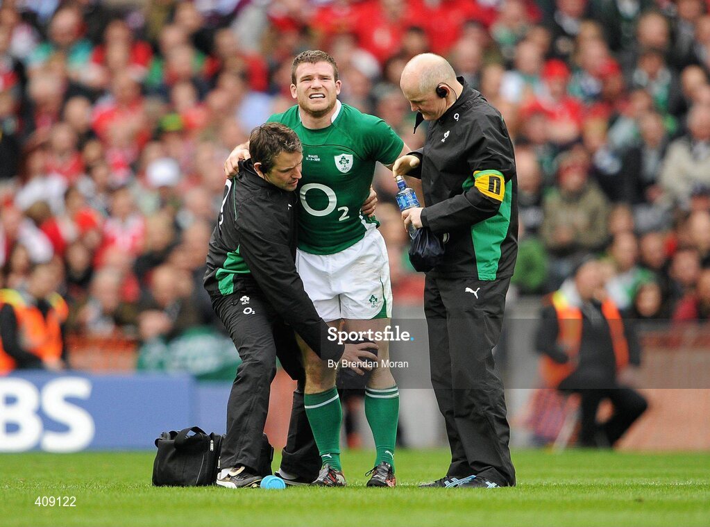 13 March 2010; Ireland's Gordon D'Arcy is treated for an injury by team physio Cameron Steele, left, and team doctor Dr. Jim McShane. RBS Six Nations Rugby Championship, Ireland v Wales, Croke Park, Dublin. Picture credit: Brendan Moran / SPORTSFILE