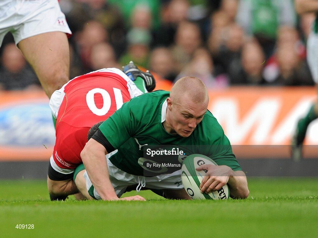 13 March 2010; Keith Earls, Ireland, touches down for a try in the 26th minute despite the efforts of Stephen Jones, Wales. RBS Six Nations Rugby Championship, Ireland v Wales, Croke Park, Dublin. Picture credit: Ray McManus / SPORTSFILE