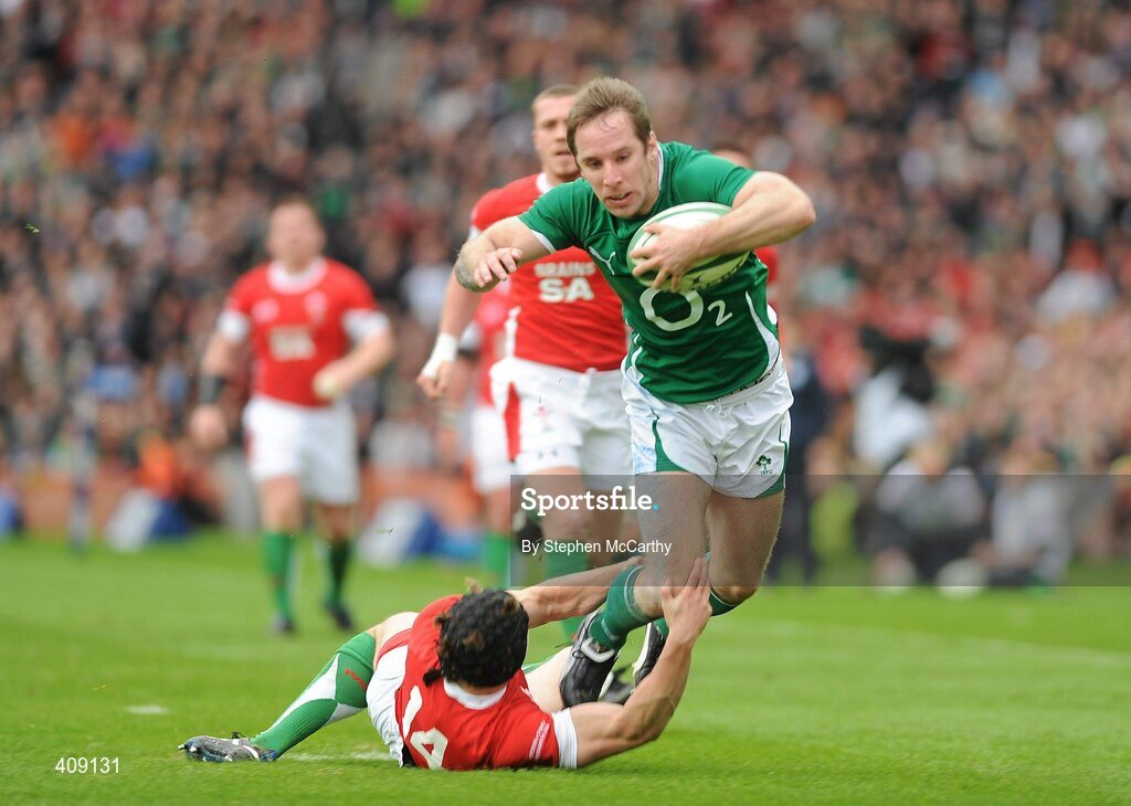 13 March 2010; Tomas O'Leary, Ireland, is tackled by Leigh Halfpenny, Wales, as he goes over to score his side's second try. RBS Six Nations Rugby Championship, Ireland v Wales, Croke Park, Dublin. Picture credit: Stephen McCarthy / SPORTSFILE