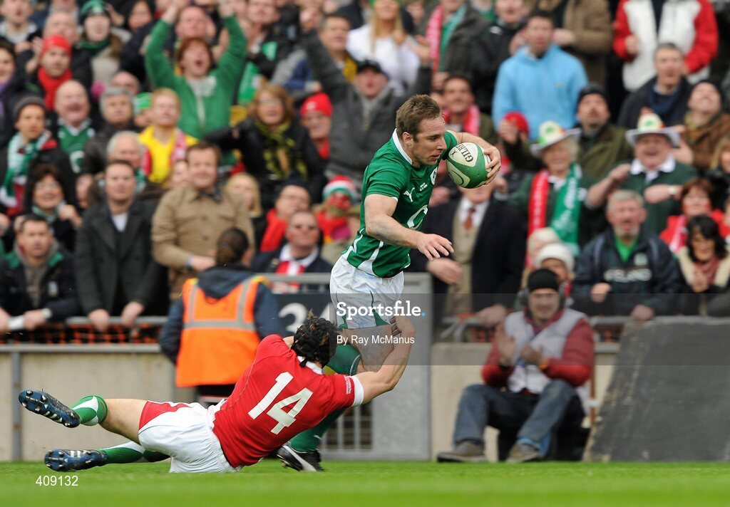 13 March 2010; Tomas O'Leary, Ireland, slips past Leigh Halfpenny, Wales, to score a try in the 31st mintue. RBS Six Nations Rugby Championship, Ireland v Wales, Croke Park, Dublin. Picture credit: Ray McManus / SPORTSFILE