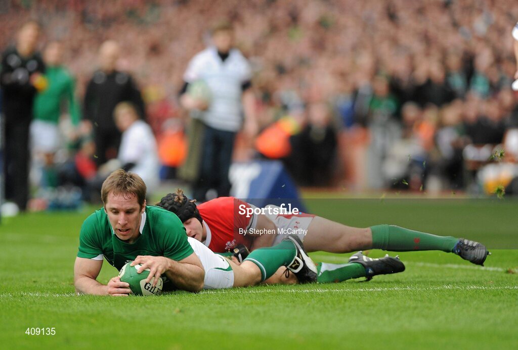 13 March 2010; Tomas O'Leary, Ireland, is tackled by Leigh Halfpenny, Wales, as he goes over to score his side's second try. RBS Six Nations Rugby Championship, Ireland v Wales, Croke Park, Dublin. Picture credit: Stephen McCarthy / SPORTSFILE