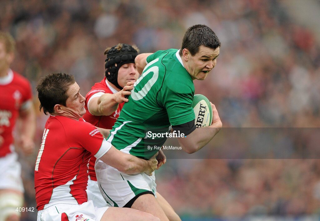 13 March 2010; Jonathan Sexton, Ireland, wins possession from Leigh Halfpenny and Shane Williams, Wales which resulted in a penalty which lead to a try. RBS Six Nations Rugby Championship, Ireland v Wales, Croke Park, Dublin. Picture credit: Ray McManus / SPORTSFILE