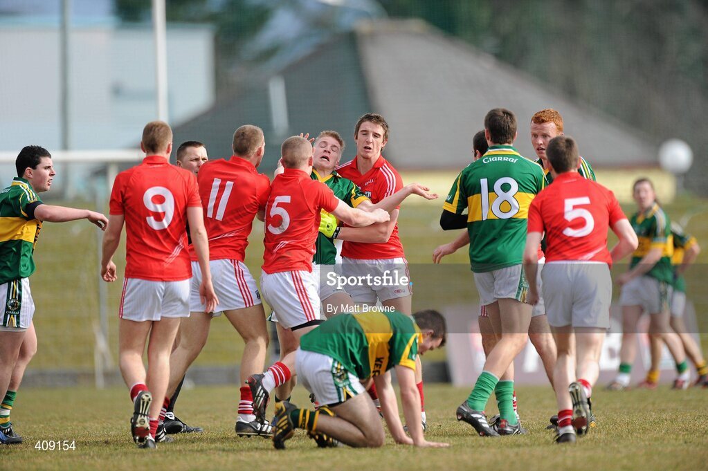 13 March 2010; Cork and Kerry players tussel during the game. Cadbury Munster GAA Football Under 21 Quarter-Final, Kerry v Cork, Austin Stack Park, Tralee, Co. Kerry. Picture credit: Matt Browne / SPORTSFILE
