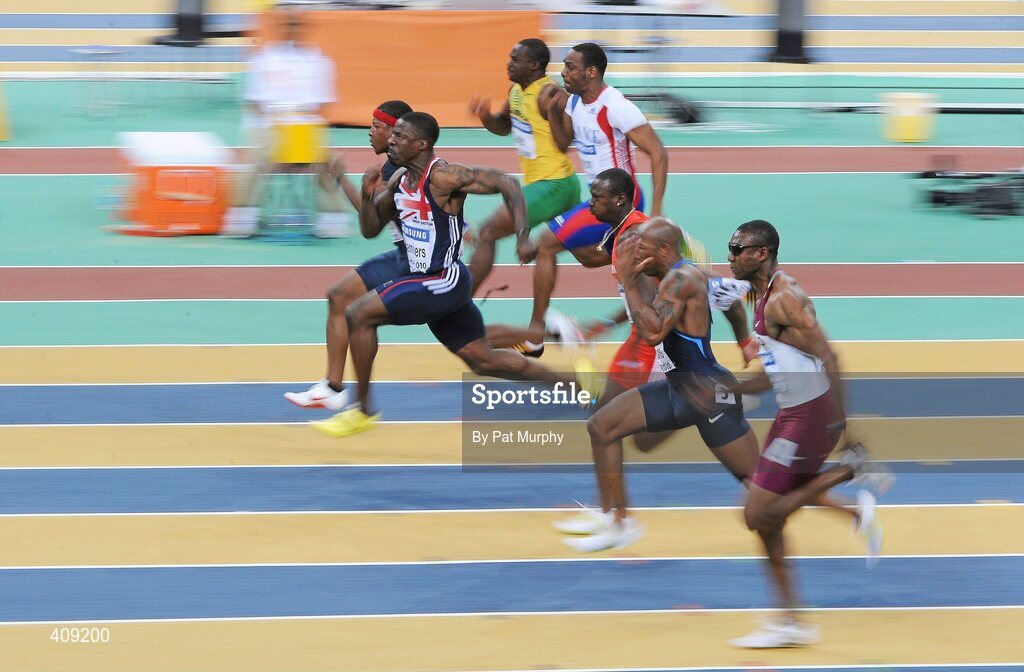 13 March 2010; Dwain Chambers, Great Britain, on his way to winning the Men's 60m final at the 13th IAAF World Indoor Athletics Championships, Doha, Qatar. Picture credit: Pat Murphy / SPORTSFILE