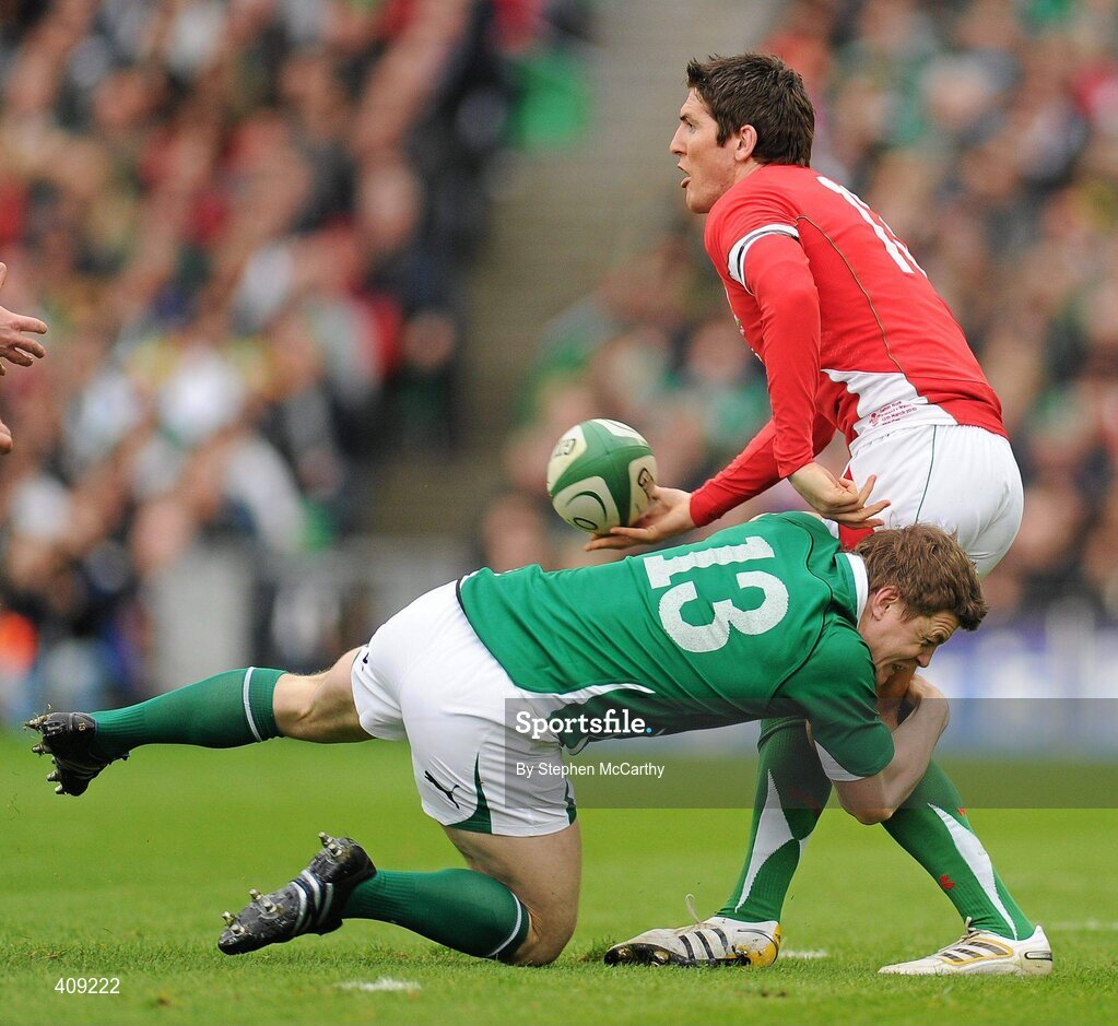 13 March 2010; James Hook, Wales, is tackled by Brian O'Driscoll, Ireland. RBS Six Nations Rugby Championship, Ireland v Wales, Croke Park, Dublin. Picture credit: Stephen McCarthy / SPORTSFILE