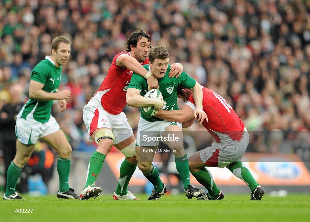 13 March 2010; Brian O'Driscoll, Ireland, is tackled by Adam Jones, Wales. RBS Six Nations Rugby Championship, Ireland v Wales, Croke Park, Dublin. Picture credit: Ray McManus / SPORTSFILE