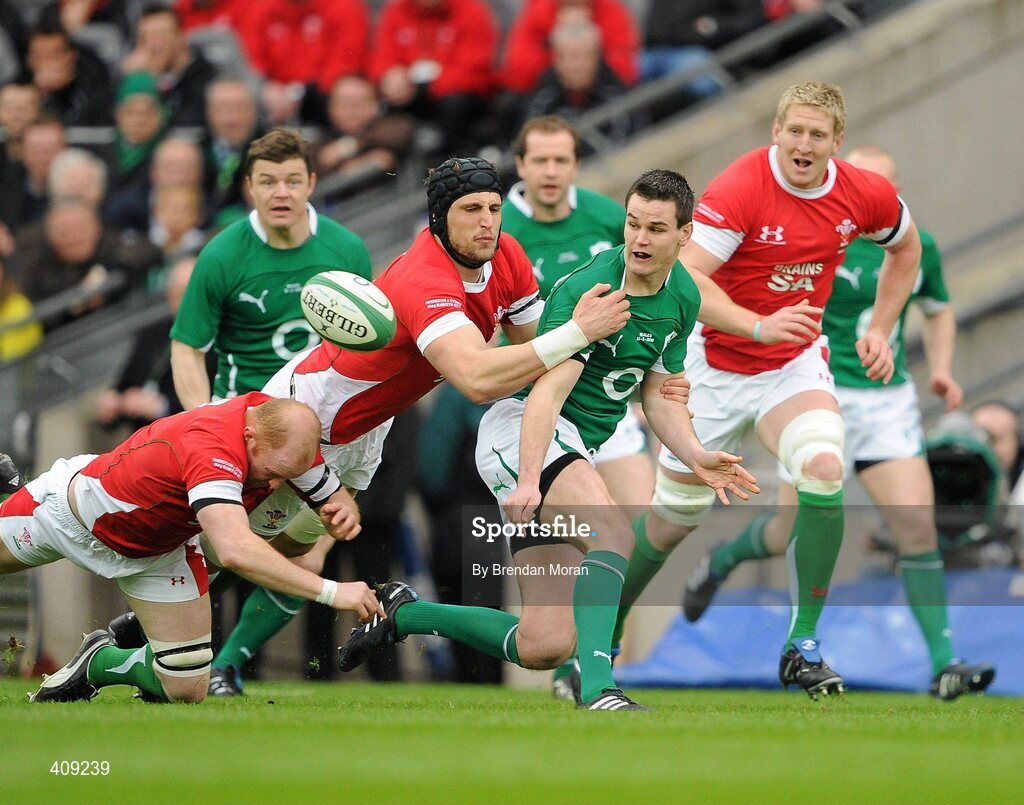13 March 2010; Jonathan Sexton, Ireland, is tackled by Martyn Williams, left, and Luke Charteris, Wales. RBS Six Nations Rugby Championship, Ireland v Wales, Croke Park, Dublin. Picture credit: Brendan Moran / SPORTSFILE