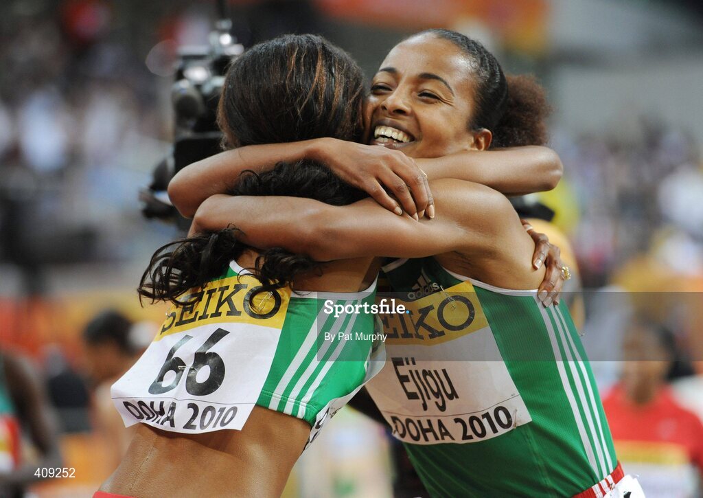 13 March 2010; Winner of the Women's 3000m Final, Ethiopia's Meseret Defar, 66, is congratulated by compatriot Sentayehu Ejigu, right, who finished in third place, at the 13th IAAF World Indoor Athletics Championships, Doha, Qatar. Picture credit: Pat Murphy / SPORTSFILE