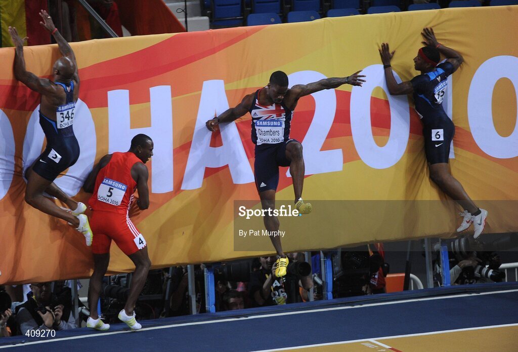 13 March 2010; The athletes jump into the crash barrier after the final of the Men's 60m at the 13th IAAF World Indoor Athletics Championships, Doha, Qatar. Picture credit: Pat Murphy / SPORTSFILE