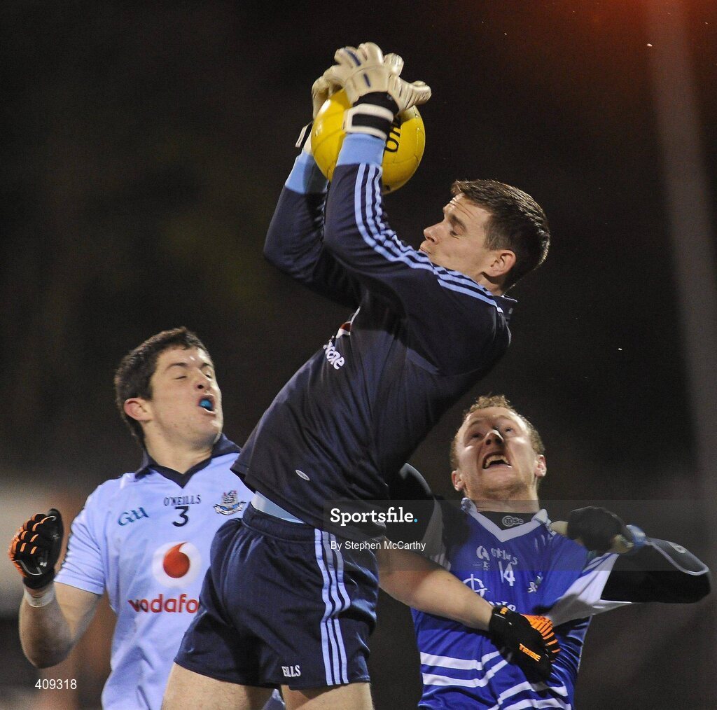 13 March 2010; Stephen Cluxton, Dublin, collects the ball despite the attention of team-mate Rory O'Carroll and Vincent Corey, Monaghan. Allianz GAA Football National League, Division 1, Round 4, Dublin v Monaghan, Parnell Park, Dublin. Picture credit: Stephen McCarthy / SPORTSFILE