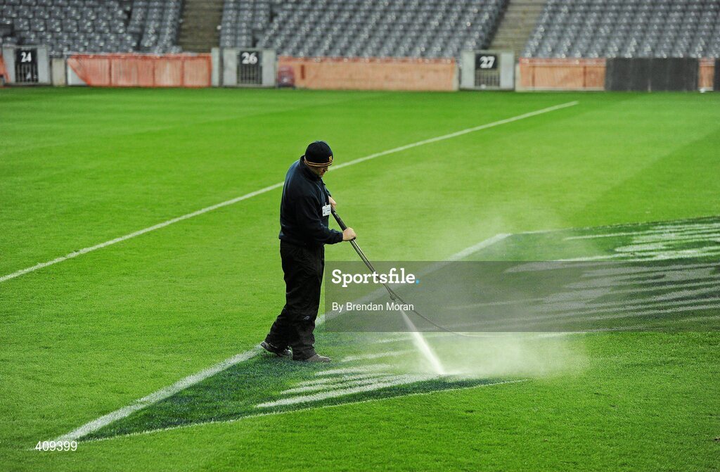 13 March 2010; A member of the groundstaff washes the advertising signage from the pitch after the game in preparation for this week's AIB GAA Senior Club Championship Finals. RBS Six Nations Rugby Championship, Ireland v Wales, Croke Park, Dublin. Picture credit: Brendan Moran / SPORTSFILE