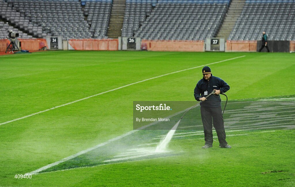 13 March 2010; A member of the groundstaff washes the advertising signage from the pitch after the game in preparation for this week's AIB GAA Senior Club Championship Finals. RBS Six Nations Rugby Championship, Ireland v Wales, Croke Park, Dublin. Picture credit: Brendan Moran / SPORTSFILE