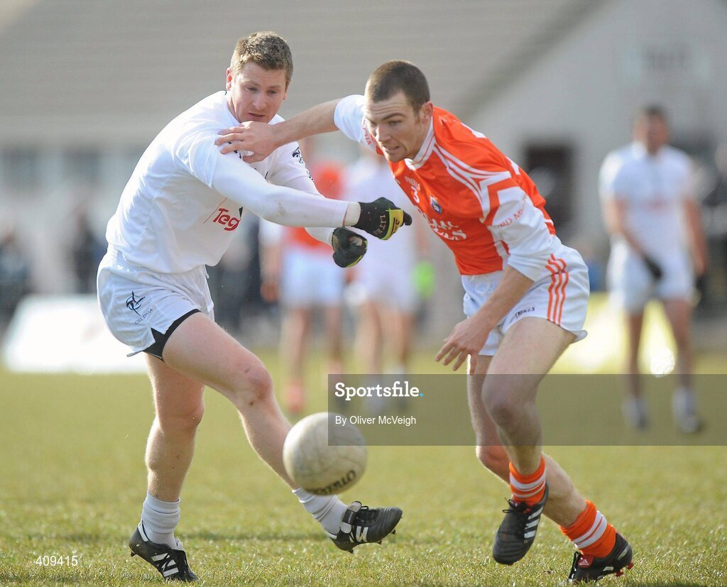 14 March 2010; Padraig O'Neill, Kildare, in action against Brendan Donaghy, Armagh. Allianz GAA Football National League, Division 2, Round 4, Armagh v Kildare, St Oliver Plunkett Park, Crossmaglen, Co. Armagh. Picture credit: Oliver McVeigh / SPORTSFILE