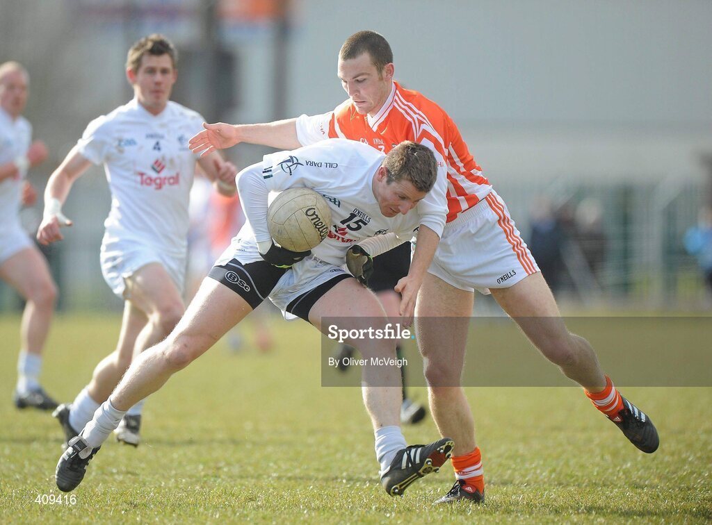 14 March 2010; Padraig O'Neill, Kildare, in action against Brendan Donaghy, Armagh. Allianz GAA Football National League, Division 2, Round 4, Armagh v Kildare, St Oliver Plunkett Park, Crossmaglen, Co. Armagh. Picture credit: Oliver McVeigh / SPORTSFILE