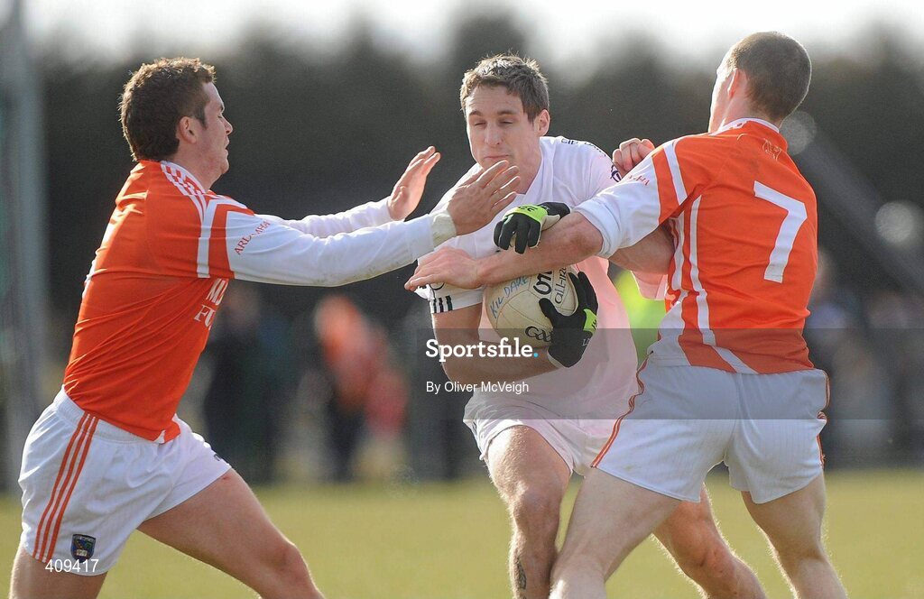 14 March 2010; Gary White, Kildare, in action against Paul Kernan and Finnian Moriarty, Armagh. Allianz GAA Football National League, Division 2, Round 4, Armagh v Kildare, St Oliver Plunkett Park, Crossmaglen, Co. Armagh. Picture credit: Oliver McVeigh / SPORTSFILE