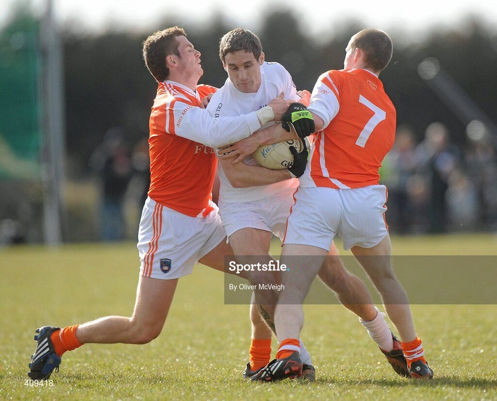 14 March 2010; Gary White, Kildare, in action against Paul Kernan and Finnian Moriarty, Armagh. Allianz GAA Football National League, Division 2, Round 4, Armagh v Kildare, St Oliver Plunkett Park, Crossmaglen, Co. Armagh. Picture credit: Oliver McVeigh / SPORTSFILE