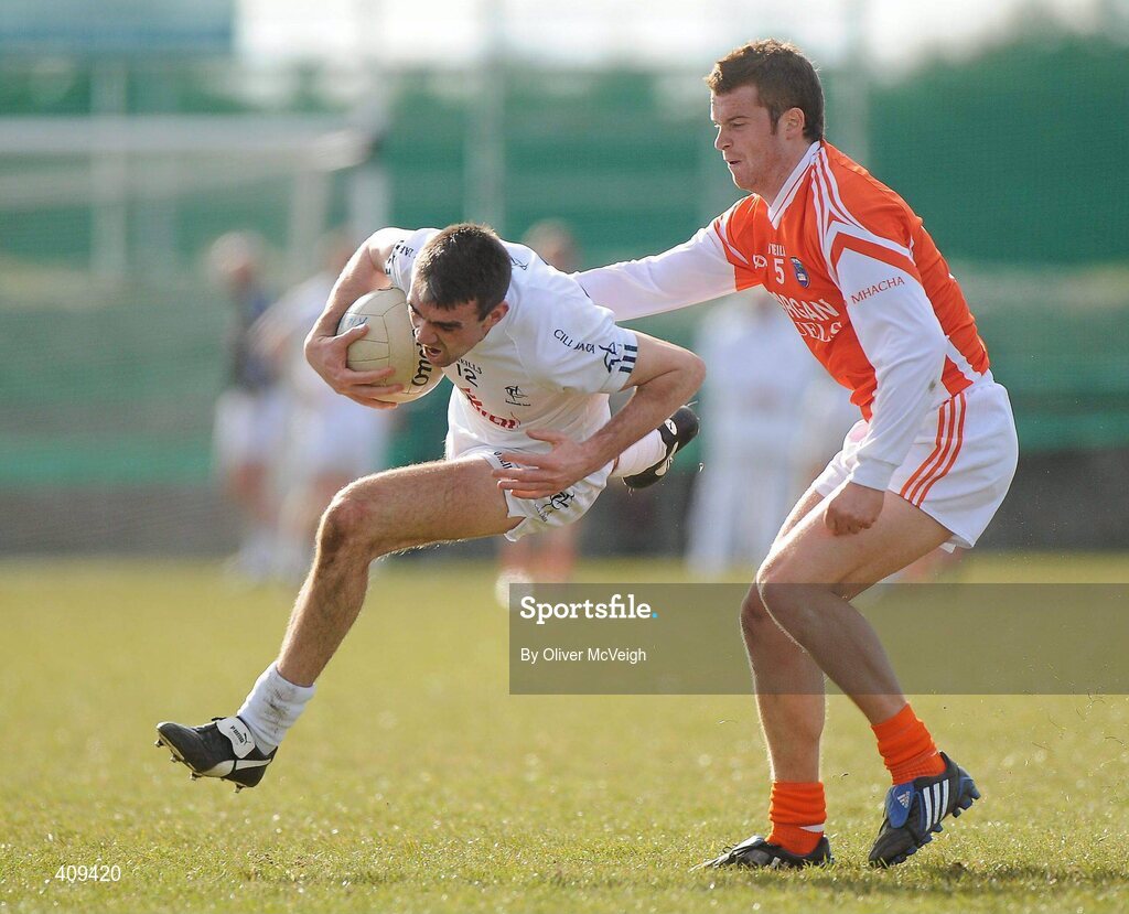 14 March 2010; John Doyle, Kildare, in action against Paul Kernan, Armagh. Allianz GAA Football National League, Division 2, Round 4, Armagh v Kildare, St Oliver Plunkett Park, Crossmaglen, Co. Armagh. Picture credit: Oliver McVeigh / SPORTSFILE