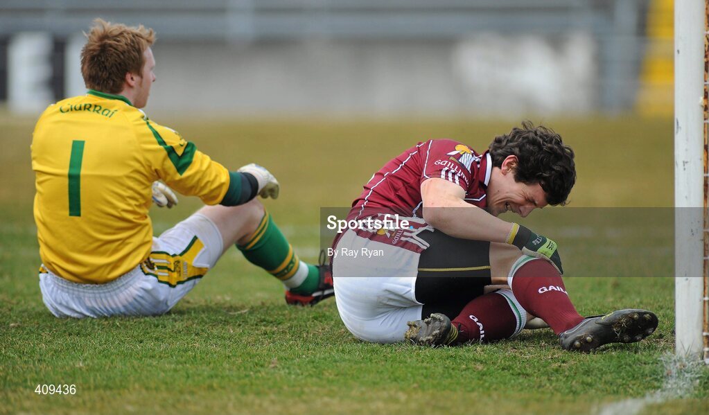 14 March 2010; Michael Meehan, Galway, right, lies injured after beating Kerry goalkeeper Brendan Kealy to score his side's goal. Allianz GAA Football National League, Division 1, Round 4, Galway v Kerry, Pearse Stadium, Galway. Picture credit: Ray Ryan / SPORTSFILE