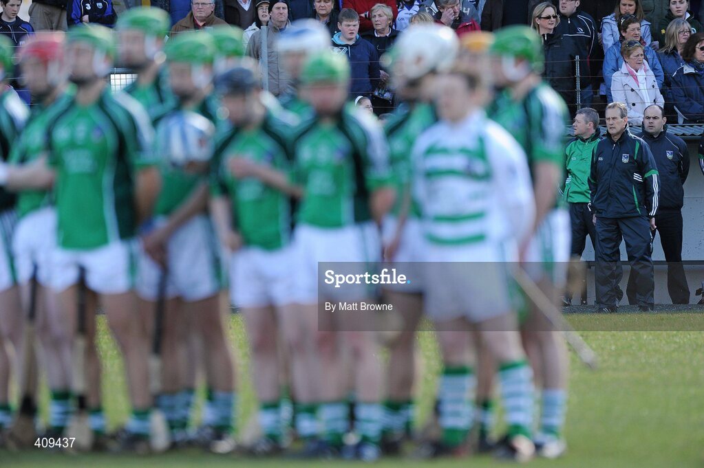 14 March 2010; Limerick manager Justin McCarthy stands for the national anthem with his players. Allianz GAA Hurling National League, Division 1, Round 3, Waterford v Limerick, Fraher Field, Dungarvan, Co. Waterford. Picture credit: Matt Browne / SPORTSFILE