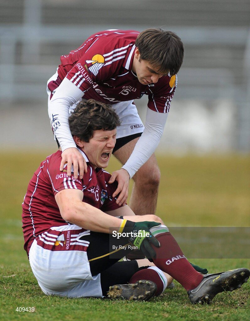 14 March 2010; Michael Meehan, Galway, is aided by team-mate Matthew Clancy after injurying himself scoring his side's goal. Allianz GAA Football National League, Division 1, Round 4, Galway v Kerry, Pearse Stadium, Galway. Picture credit: Ray Ryan / SPORTSFILE