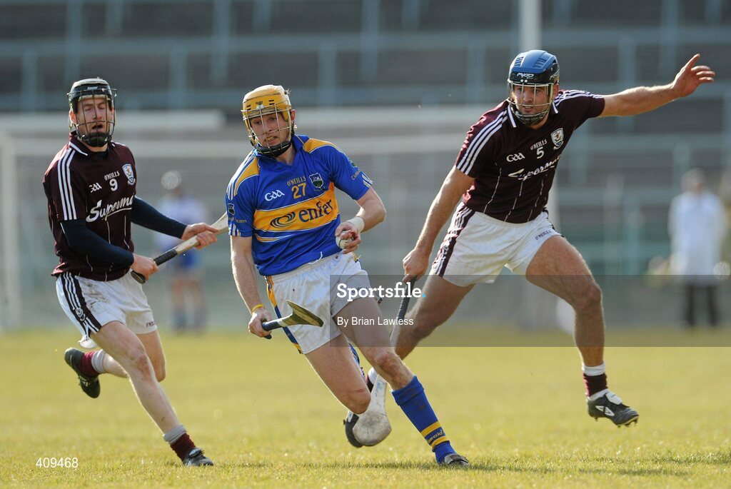 14 March 2010; Shane McGrath, Tipperary, in action against Niall Cahalan, left, and David Collins, Galway. Allianz GAA Hurling National League, Division 1, Round 3, Tipperary v Galway, Semple Stadium, Thurles, Co. Tipperary. Picture credit: Brian Lawless / SPORTSFILE