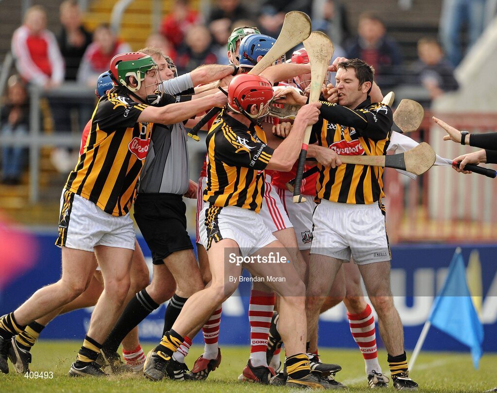 14 March 2010; Referee Dickie Murphy attempts to separate players from Cork and Kilkenny. Subsequently Michael Grace, right, was shown a red card. Allianz GAA Hurling National League, Division 1, Round 3, Cork v Kilkenny, Pairc Ui Chaoimh, Cork. Picture credit: Brendan Moran / SPORTSFILE
