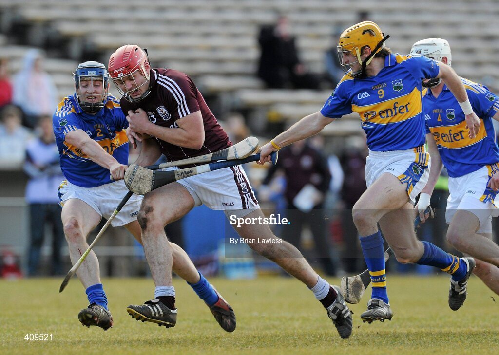 14 March 2010; Iarla Tannian, Galway, in action against Paddy Stapleton, left, and Shane McGrath, Tipperary. Allianz GAA Hurling National League, Division 1, Round 3, Tipperary v Galway, Semple Stadium, Thurles, Co. Tipperary. Picture credit: Brian Lawless / SPORTSFILE