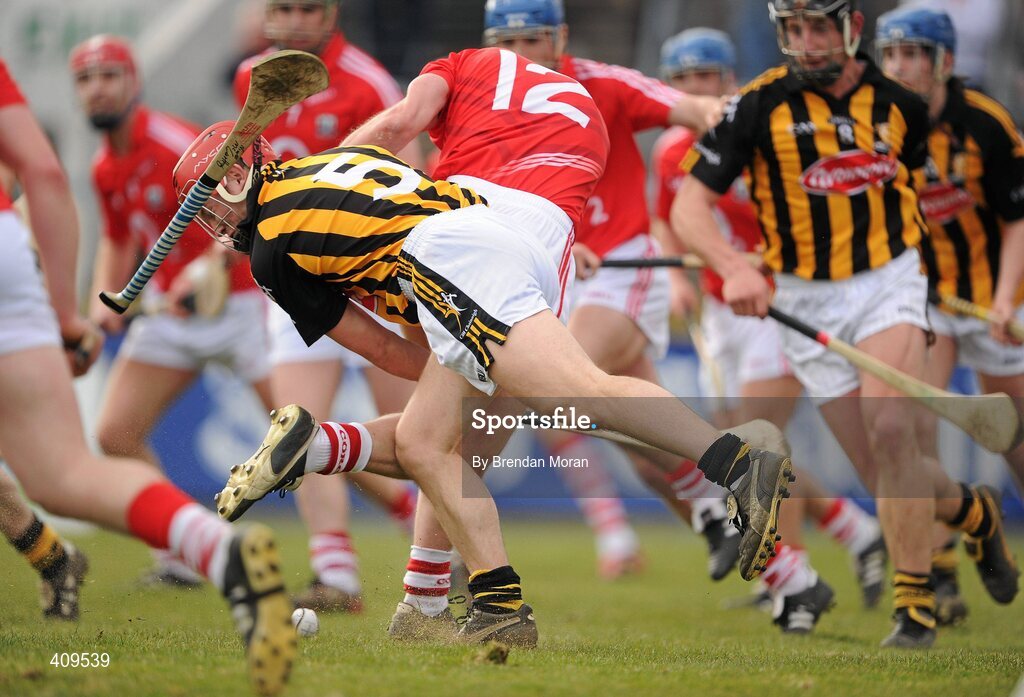 14 March 2010; Cork's Niall McCarthy loses his hurley on pulling on the sliotar with Kilkenny's Tommy Walsh. McCarthy was shown a yellow card by referee Dickie Murphy after this incident. Allianz GAA Hurling National League, Division 1, Round 3, Cork v Kilkenny, Pairc Ui Chaoimh, Cork. Picture credit: Brendan Moran / SPORTSFILE