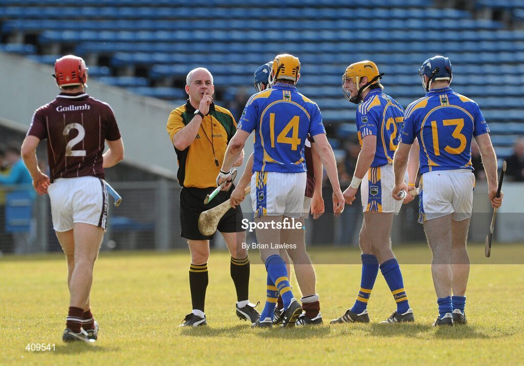 14 March 2010; Referee John Sexton signals for quietness from the players during the match. Allianz GAA Hurling National League, Division 1, Round 3, Tipperary v Galway, Semple Stadium, Thurles, Co. Tipperary. Picture credit: Brian Lawless / SPORTSFILE