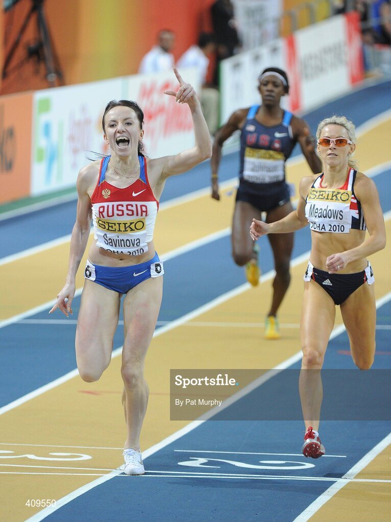 14 March 2010; Mariya Savinova, Russia, celebrates as she crosses the finish line ahead of second placed Jennifer Meadows, Great Britain, right, to win the Women's 800m final at the 13th IAAF World Indoor Athletics Championships, Doha, Qatar. Picture credit: Pat Murphy / SPORTSFILE