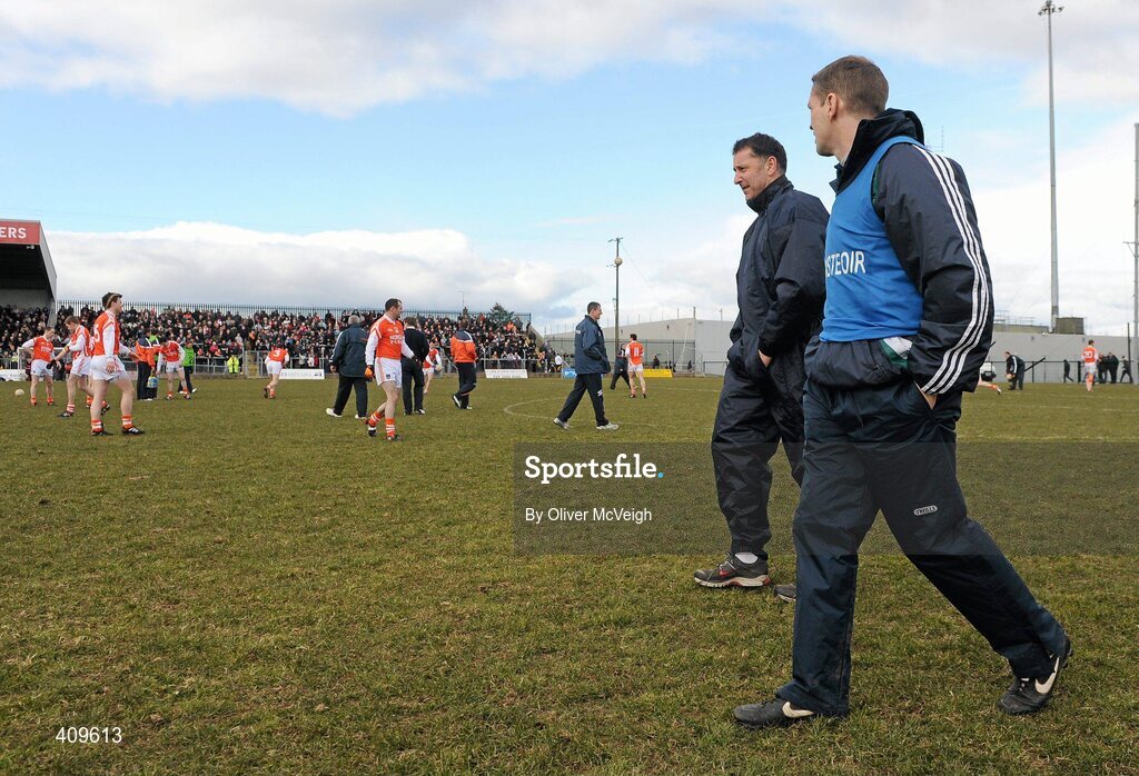 14 March 2010; Kildare manager, Kieran McGeeney, enters the field and has a look over at the Armagh squad warming up. Allianz GAA Football National League, Division 2, Round 4, Armagh v Kildare, St Oliver Plunkett Park, Crossmaglen, Co. Armagh. Picture credit: Oliver McVeigh / SPORTSFILE