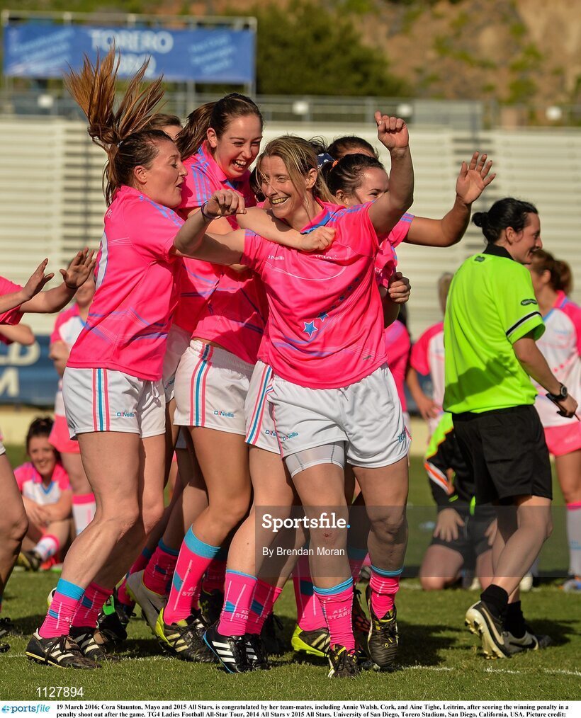 19 March 2016; Cora Staunton, Mayo and 2015 All Stars, is congratulated by her team-mates, including Annie Walsh, Cork, and Aine Tighe, Leitrim, after scoring the winning penalty in a penalty shoot out after the game. TG4 Ladies Football All-Star Tour, 2014 All Stars v 2015 All Stars. University of San Diego, Torero Stadium, San Diego, California, USA. Picture credit: Brendan Moran / SPORTSFILE