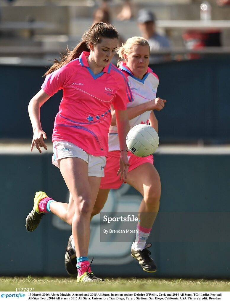 19 March 2016; Aimee Mackin, Armagh and 2015 All Stars, in action against Deirdre O'Reilly, Cork and 2014 All Stars. TG4 Ladies Football All-Star Tour, 2014 All Stars v 2015 All Stars. University of San Diego, Torero Stadium, San Diego, California, USA. Picture credit: Brendan Moran / SPORTSFILE