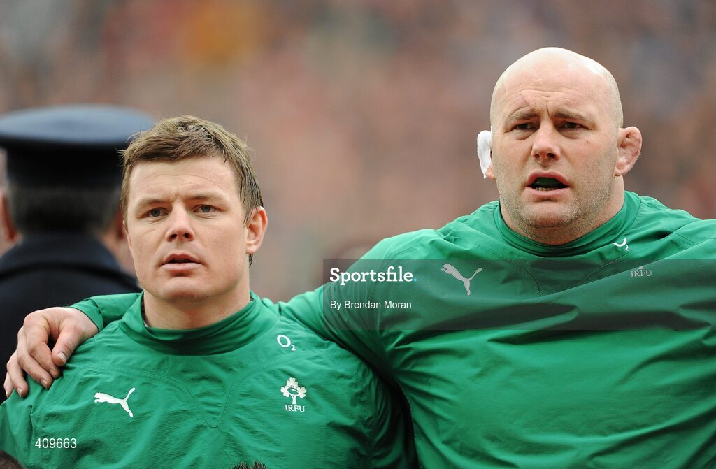 13 March 2010; Ireland captain Brian O'Driscoll, left, on the occasion of earning his 100th cap for Ireland, alongside team-mate John Hayes, on the occasion of earning his 101st cap, stand together during the national anthems before the game. RBS Six Nations Rugby Championship, Ireland v Wales, Croke Park, Dublin. Picture credit: Brendan Moran / SPORTSFILE