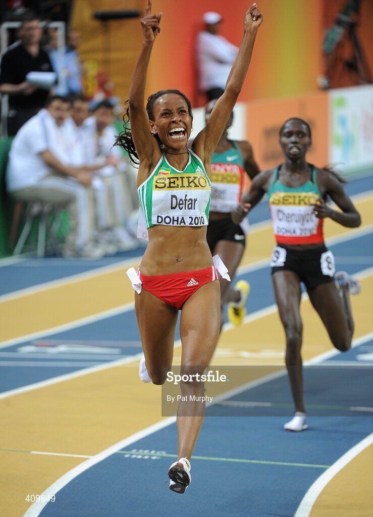 13 March 2010; Meseret Defar, Ethiopia, celebrates as she crosses the finish line to win the Women's 3000m Final at the 13th IAAF World Indoor Athletics Championships, Doha, Qatar. Picture credit: Pat Murphy / SPORTSFILE