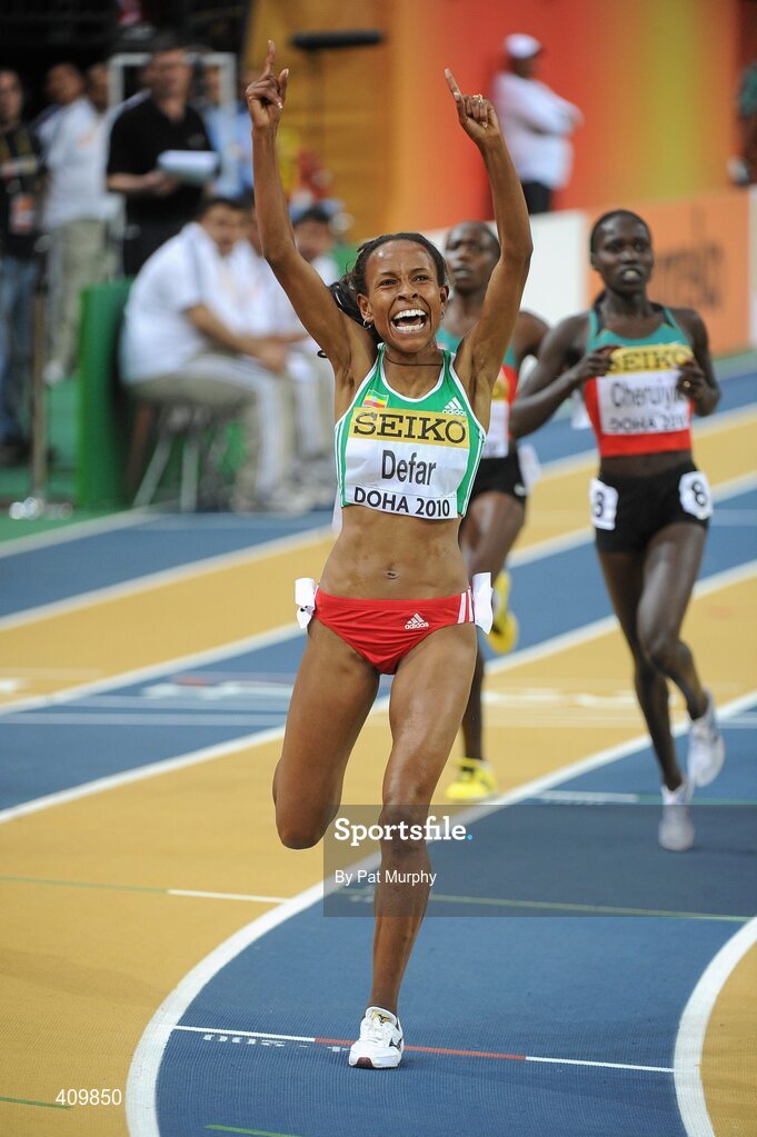 13 March 2010; Meseret Defar, Ethiopia, celebrates as she crosses the finish line to win the Women's 3000m Final at the 13th IAAF World Indoor Athletics Championships, Doha, Qatar. Picture credit: Pat Murphy / SPORTSFILE
