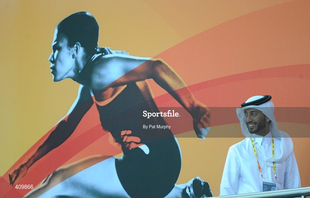 14 March 2010; A local steward watches the 13th IAAF World Indoor Athletics Championships, Doha, Qatar. Picture credit: Pat Murphy / SPORTSFILE