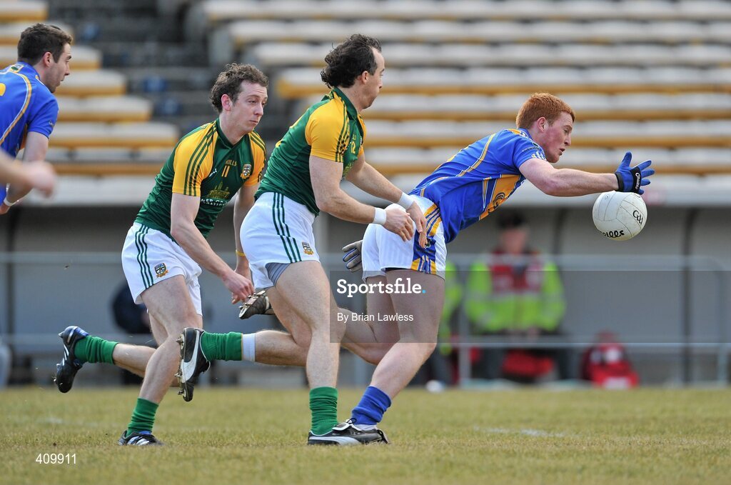 14 March 2010; George Hannigan, Tipperary, in action against Jamie Queeney, left, and Anthony Moyles, Meath. Allianz GAA Football National League, Division 2, Round 4, Tipperary v Meath, Semple Stadium, Thurles, Co. Tipperary. Picture credit: Brian Lawless / SPORTSFILE