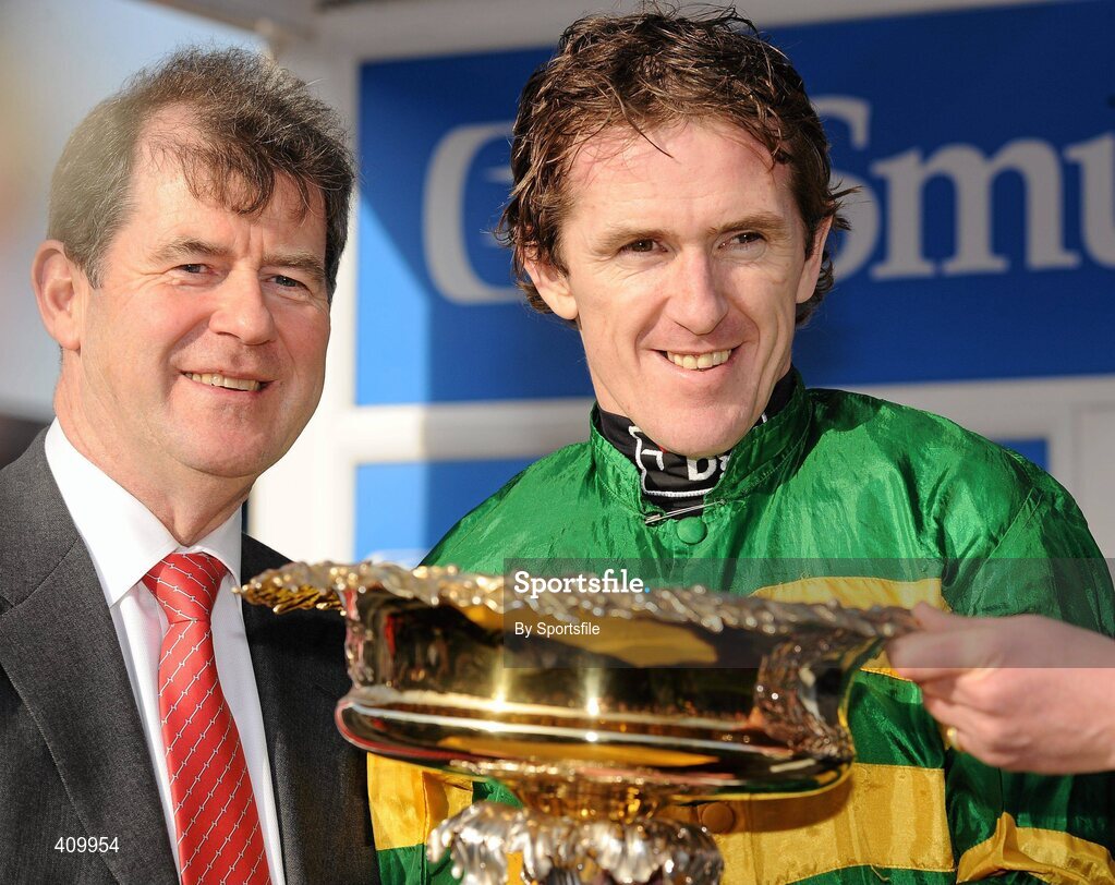 16 March 2010; Jockey Tony McCoy and owner of Binocular JP McManus after winning the Smurfit Kappa Champion Hurdle Challenge Trophy. Cheltenham Racing Festival - Tuesday. Prestbury Park, Cheltenham, Gloucestershire, England. Photo by Sportsfile