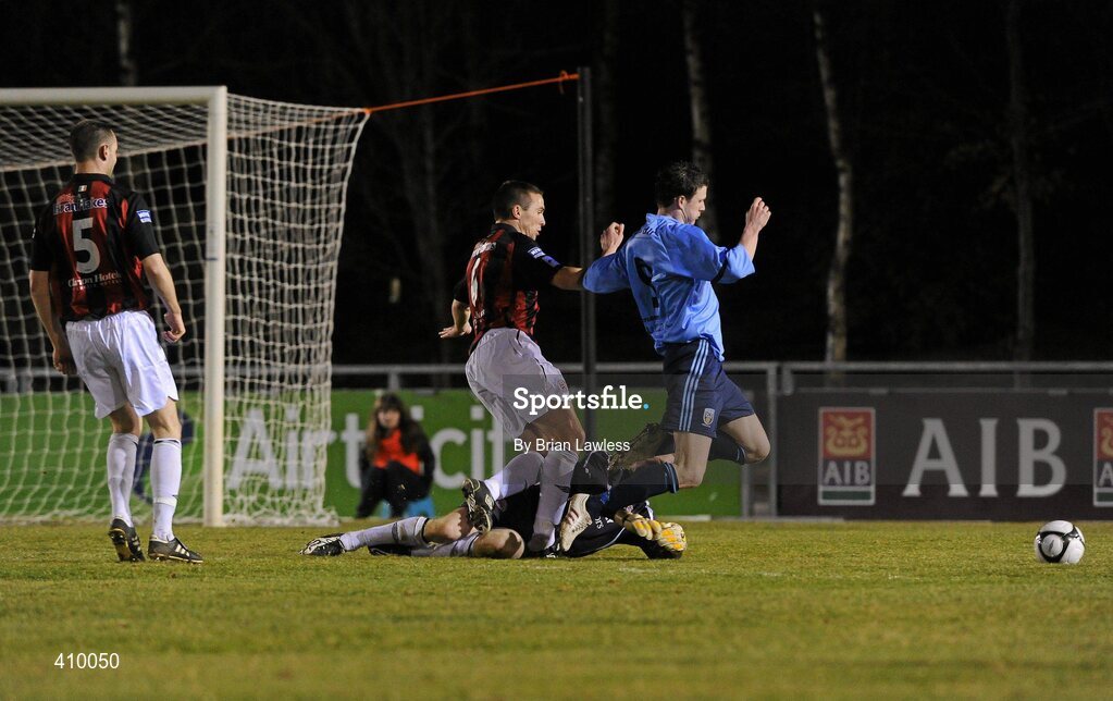 16 March 2010; Ciaran Kilduff, UCD, goes down under the challenge of Bohemians' goalkeeper Chris O'Connor and team-mate Brian Shelley which resulted in a penalty. The penalty was subsequently scored by UCD's Greg Bolger. Airtricity League Premier Division, UCD v Bohemians, UCD Bowl, Belfield, Dublin. Picture credit: Brian Lawless / SPORTSFILE