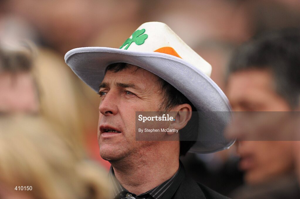 17 March 2010; A punter watches on during the 140th Year Of The National Hunt Chase Challenge Cup. Cheltenham Racing Festival - Wednesday. Prestbury Park, Cheltenham, Gloucestershire, England. Picture credit: Stephen McCarthy / SPORTSFILE